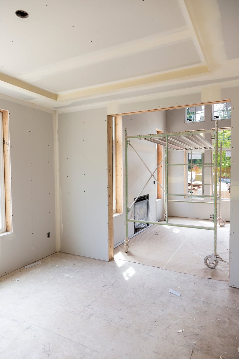 Drywall installation in a new home contruction